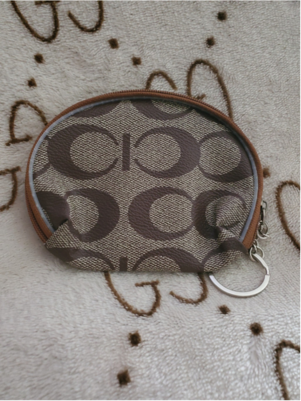 Compact round Coach styled coin purse, so cute!